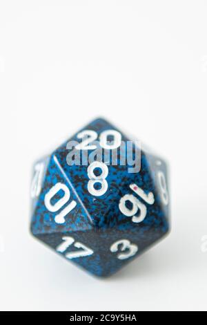 A nat 20 is rolled on a 20 sided dice used for agmes of Dungeons & Dragons, a popular tabletop roleplaying game. Stock Photo