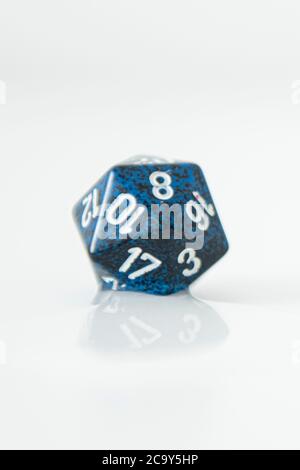 A nat 20 is rolled on a 20 sided dice used for agmes of Dungeons & Dragons, a popular tabletop roleplaying game. Stock Photo