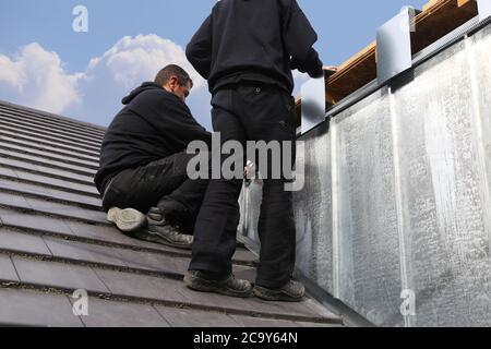 New roof with dormer under construction Stock Photo