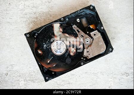 open and damaged hard disk drive Stock Photo