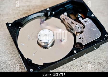 open and damaged hard disk drive Stock Photo