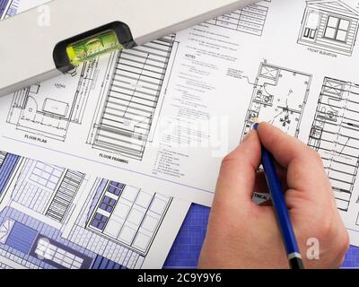 Working on blueprints Stock Photo