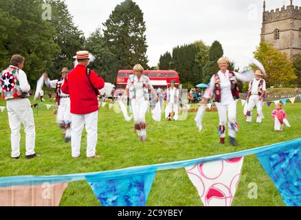 Morris dancers at an country village fete on a playing field Stock Photo