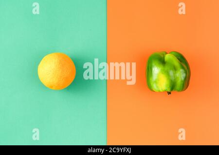 Creative layout made of orange and pepper. Food concept. Fresh grocery Stock Photo