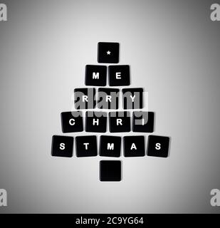 Christmas tree made of computer keys Stock Photo