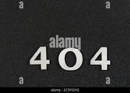 404 white numbers on black background. Close up. Error concept Stock Photo
