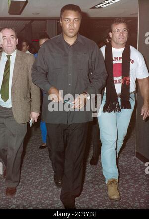 Muhammad Ali arriving at London Heathrow Airport 1989 Stock Photo