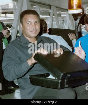 Muhammad Ali arriving at London Heathrow Airport 1989 Stock Photo