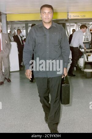 Muhammad Ali arriving at London Heathrow Airport 1989 Stock Photo