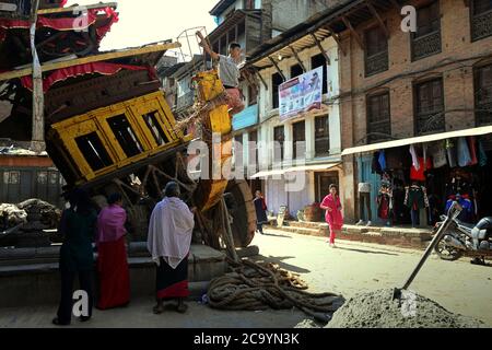 Citizens walking on a busy street in the old city of Bhaktapur, one year after the 2015 devastating earthquakes struck Nepal. Stock Photo