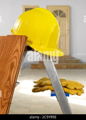 Hardhat and protection gloves Stock Photo