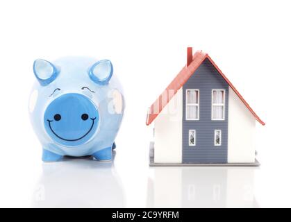 House and piggy bank Stock Photo