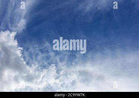 Cirrus clouds against a pale blue sky Stock Photo