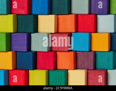 Multi-colored wooden toy blocks background Stock Photo