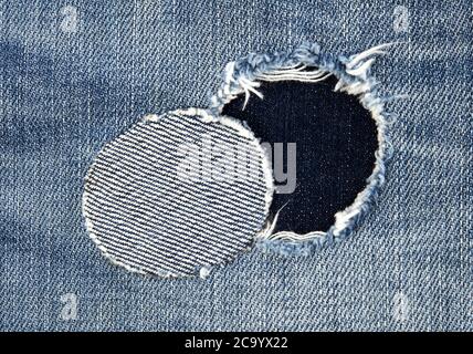 Patched jeans close-up Stock Photo