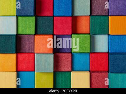 Multi-colored wooden toy blocks background Stock Photo