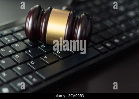 Judge's gavel on computer keyboard. Cyber crime concept Stock Photo