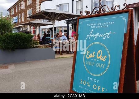 Eat out to help out is a government incentive to encourage people to eat out more. Pictured is one of the bars offering the discount and taking part in the scheme. Stock Photo