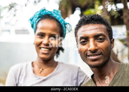 Portrait of young smiling man and woman, Berhale, Afar Region, Ethiopia, Africa Stock Photo