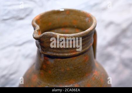 clay jug , old milk storage vessel Stock Photo