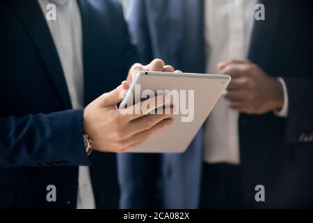 Project developer holding tablet make proposal to customer closeup image Stock Photo