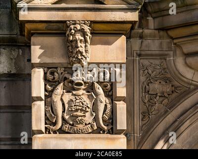 Fish, oak & St Mungo, Glasgow coat of arms on Great Michael House formerly SCWS building, Leith, Edinburgh, Scotland, UK Stock Photo