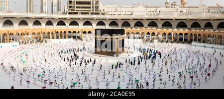 Muslim pilgrims in Al Haram Mosque Makkah performing Tawaf , Hajj Season at the time of the Corona Covid 19 , Covid 19 precautionary measures.Saudi Ar Stock Photo