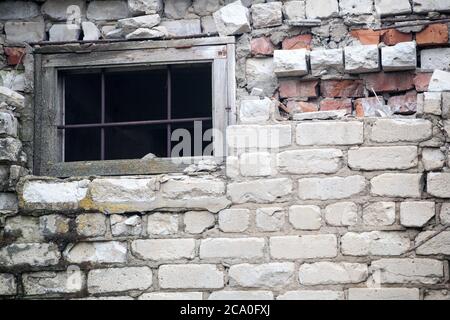 Real old brick wall crumbling from time to time Stock Photo