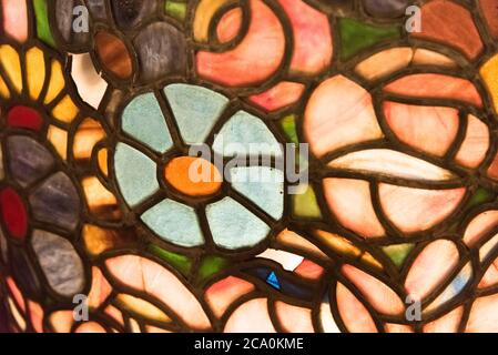 CABA, Buenos Aires / Argentina; July 27, 2019; detail of a stained glass belonging to the original exterior lighting of the facade of the historic Con Stock Photo