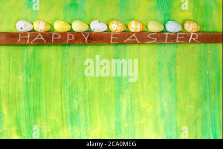 row of multicolored easter eggs, easter decoration mock up ,free copy space Stock Photo