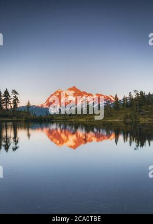 Picture lake on sunset with a reflection of mt. Shuksan, Washington Stock Photo