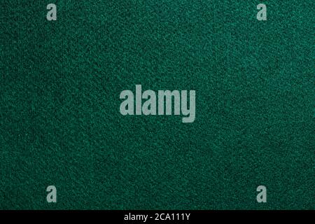 Texture of a green mat of poker cards. Stock Photo
