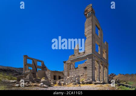 old damaged house in death valley ghost town is a ruin of an old history school located in nevada desert Stock Photo