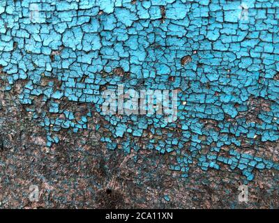 cracked paint on a wooden board. background old board wooden color blue black Stock Photo