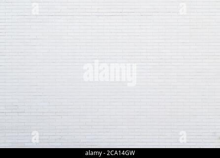 White new brick wall viewed from the front. High resolution full frame textured background. Copy space. Stock Photo
