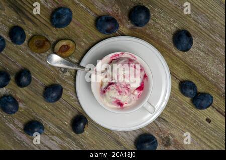 A bowl of damson ice-cream Stock Photo