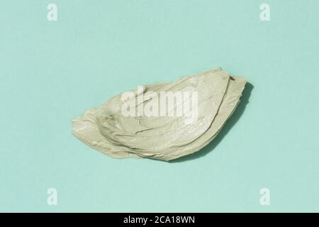Smear of green clay face mask. Top view. Stock Photo