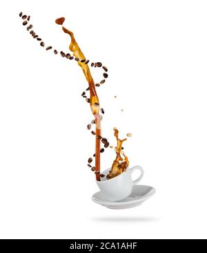 Porcelaine white cup with splashing coffee liquid with coffee beans, isolated on white background. Hot drink with splash, beverages and refreshment. Stock Photo