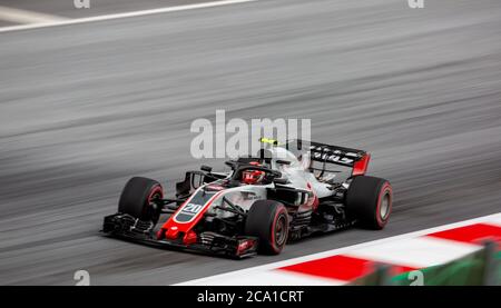 Kevin Magnussen in his Haas VF-18 Ferrari engined F1 car during qualifying of the 2018 Austrian Grand Prix at the Red Bull Ring. Stock Photo