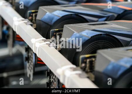 Closeup photo of graphics video card on ethereum cryptocurrency mining rig. Stock Photo