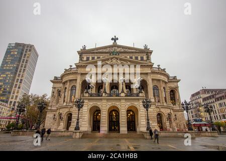 Frontal view of the old opera building at a rainy and cloudy day in Frankfurt, Germany Stock Photo
