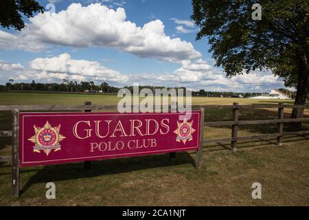 Egham, UK. 3rd August, 2020. A sign in front of the Queen’s Ground indicates the Guards Polo Club in Windsor Great Park. Credit: Mark Kerrison/Alamy Live News Stock Photo