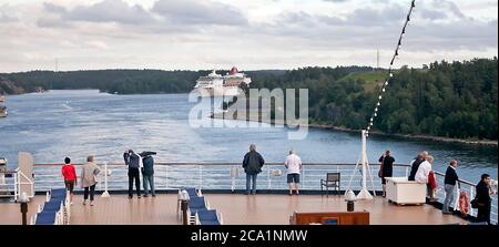 Cruise ships navigate the Stockholm Archipelago, Sweden Stock Photo