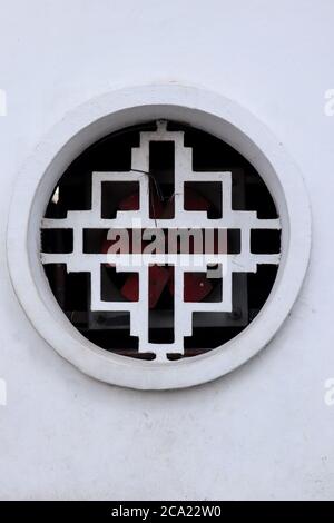 Round ventilation window in Chinese style with white background Stock Photo