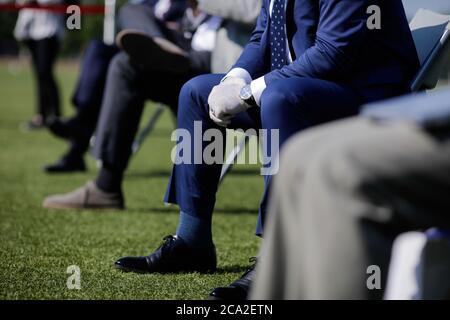 Details with the hands of a man in gloves due to the Covid-19 outbreak. Stock Photo