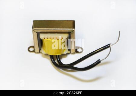 Electronic transformer with wires isolated on a white background Stock Photo