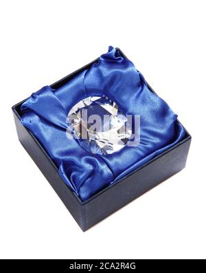 diamond in the blue velvet isolated on the white background Stock Photo