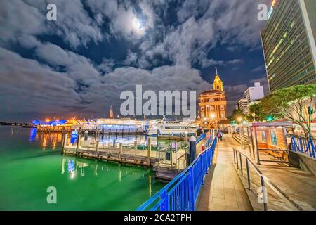 AUCKLAND, NEW ZEALAND - AUGUST 26, 2018: Night view of city port along the sea.