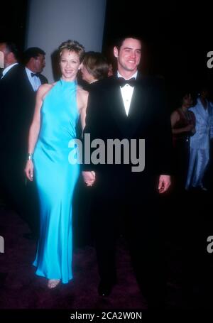 Beverly Hills, California, USA 29th February 1996 Actress Lauren Holly and actor Jim Carrey attend the 24th Annual American Film Institute Lifetime Achievement Awards Honoring Clint Eastwood on February 29, 1996 at the Beverly Hilton Hotel in Beverly Hills, California, USA. Photo by Barry King/Alamy Stock Photo Stock Photo