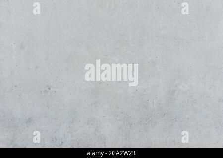 Abstract gray concrete wall as background. Gray cement texture. Empty exposed concrete wall. Texture of old gray concrete surface for background. Grey Stock Photo
